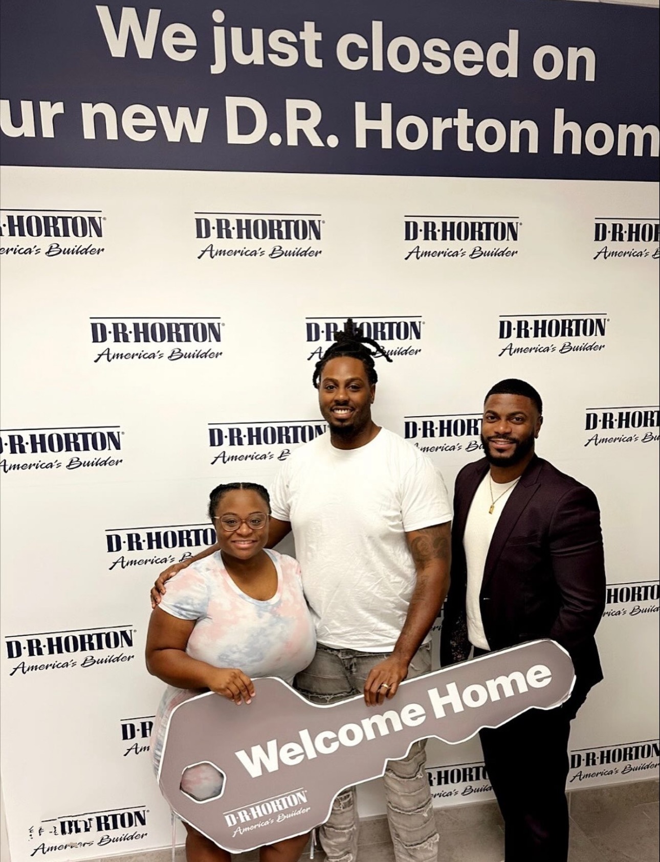 Marcus with happy buyers at closing